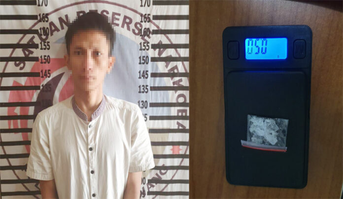 Seorang terduga pengedar narkoba jenis sabu berinisial PH als SI (24), yang dibekuk petugas dari Satresnarkoba Polres Tulang Bawang